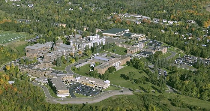 St. Scholastica campus with the Benedictine Health Center to the left of the Monastery and with The College of St. Scholastica to the north and in front of the Monastery.