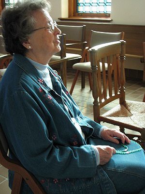 Sister Melanie Gagne praying the rosary
