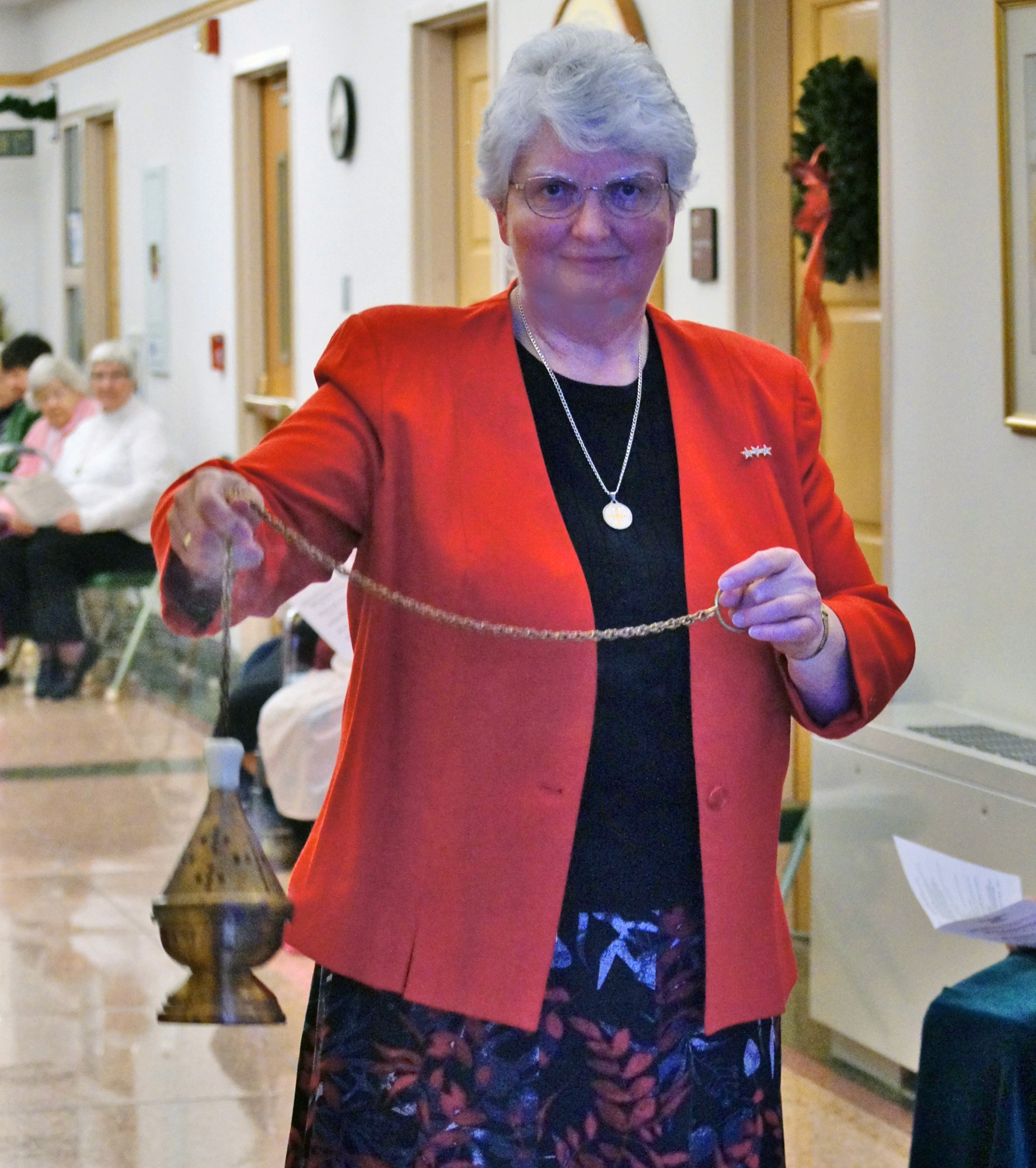 Sister Beverly Raway, prioress, blesses the Monastery on Epiphany.