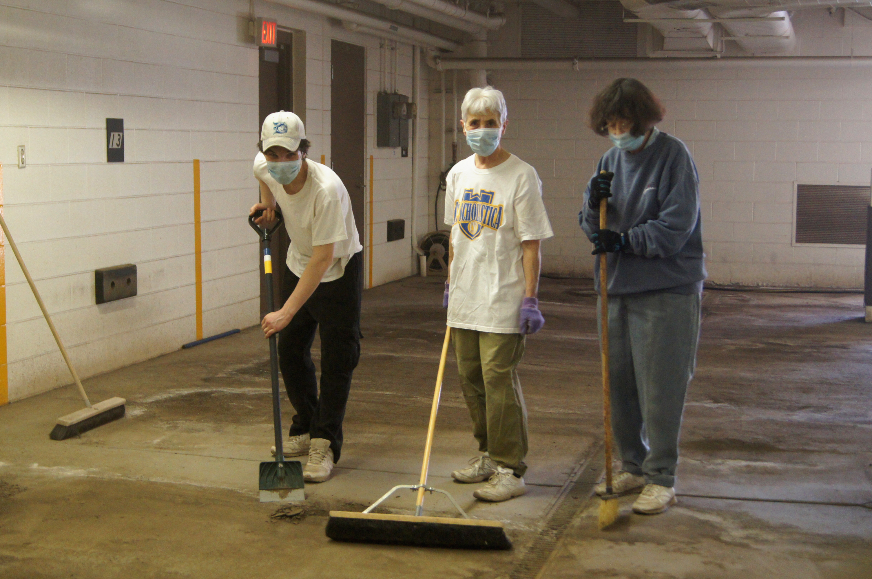Sister Teri Spinler and volunteers sweep out the garage each spring