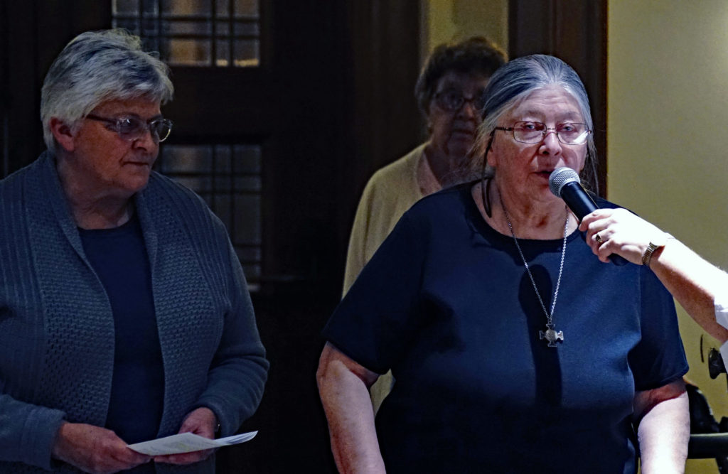 Jayne with Sister Donna waits at the threshold.